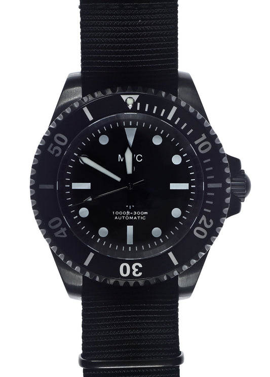 MWC 24 Jewel 1982 Pattern 300m Automatic Military Divers Watch in Black PVD with a Sapphire Crystal on a NATO Webbing Strap (Non Date Version)